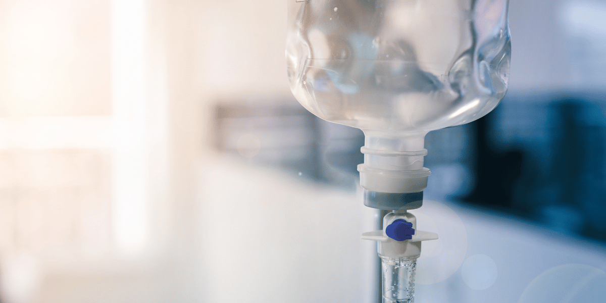 Close up of IV therapy drip bag