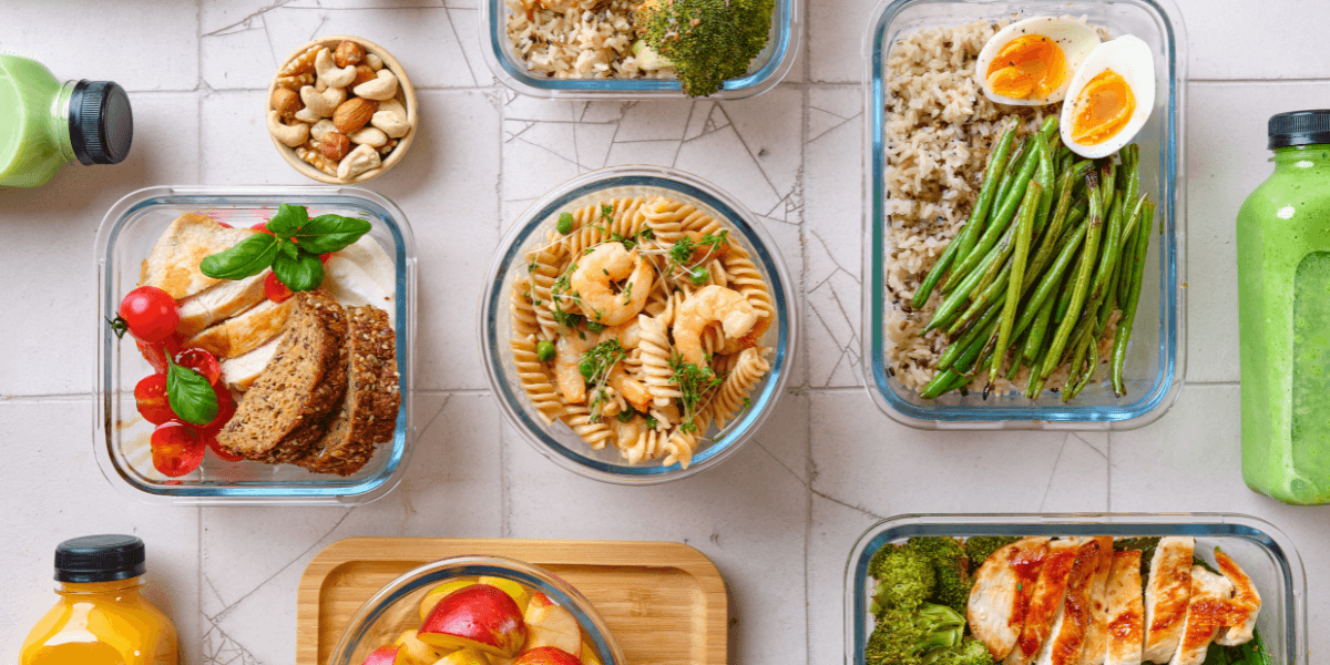 A large group of different nutrient dense foods on a table.