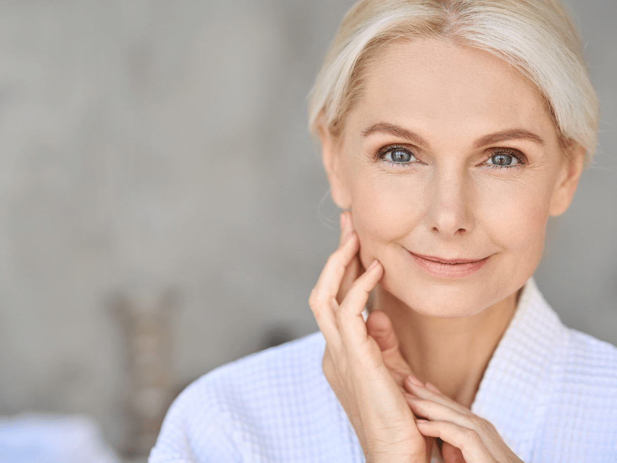 Lux Beauty - Older woman with radiant skin and glow